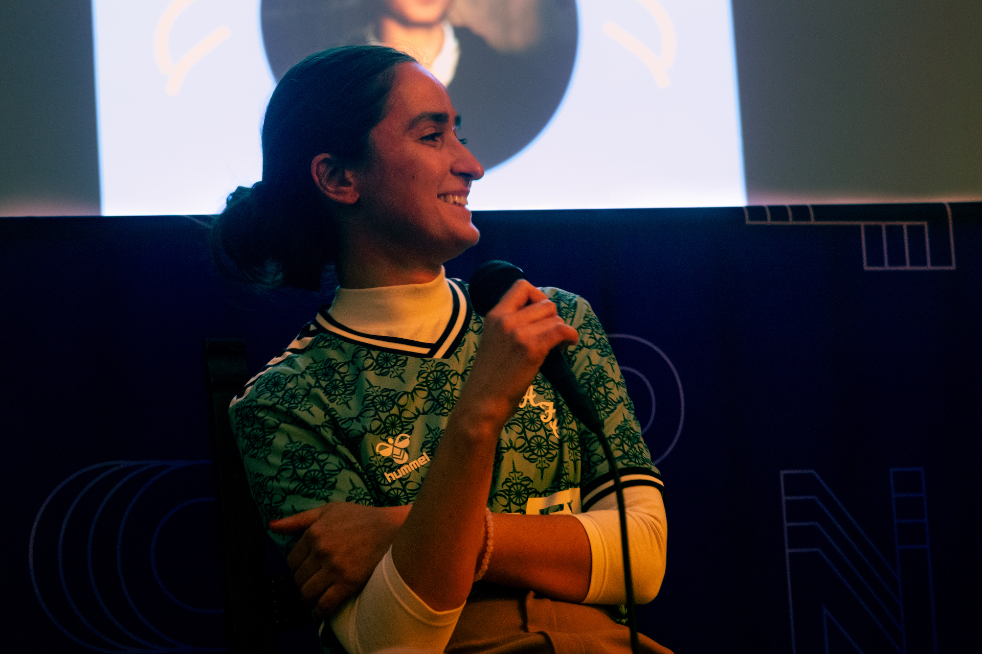 Hu-Sane discussing her work.