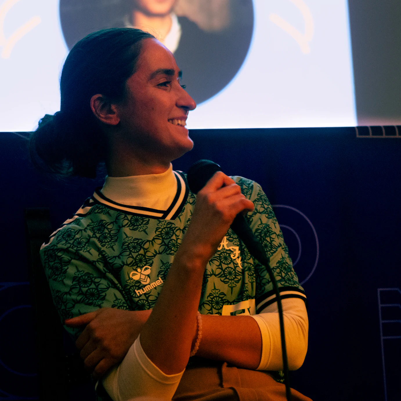 Hu-Sane discussing her work.