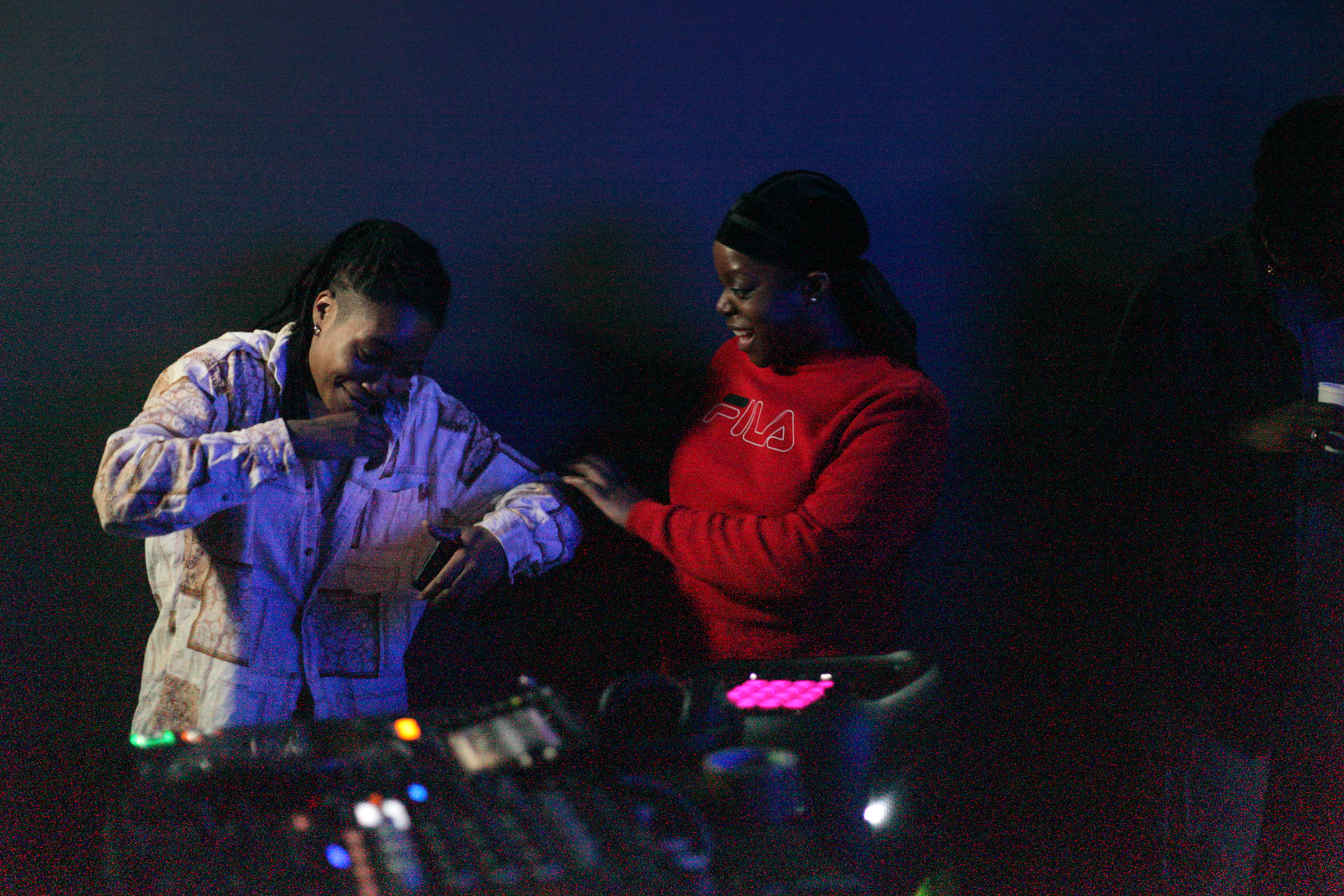Afro Energy participants smiling together during the listening party.