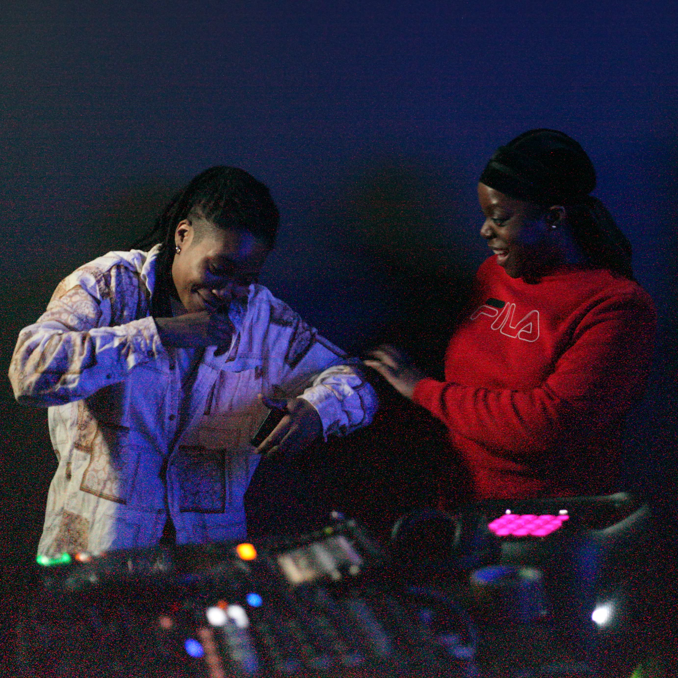 Afro Energy participants smiling together during the listening party.