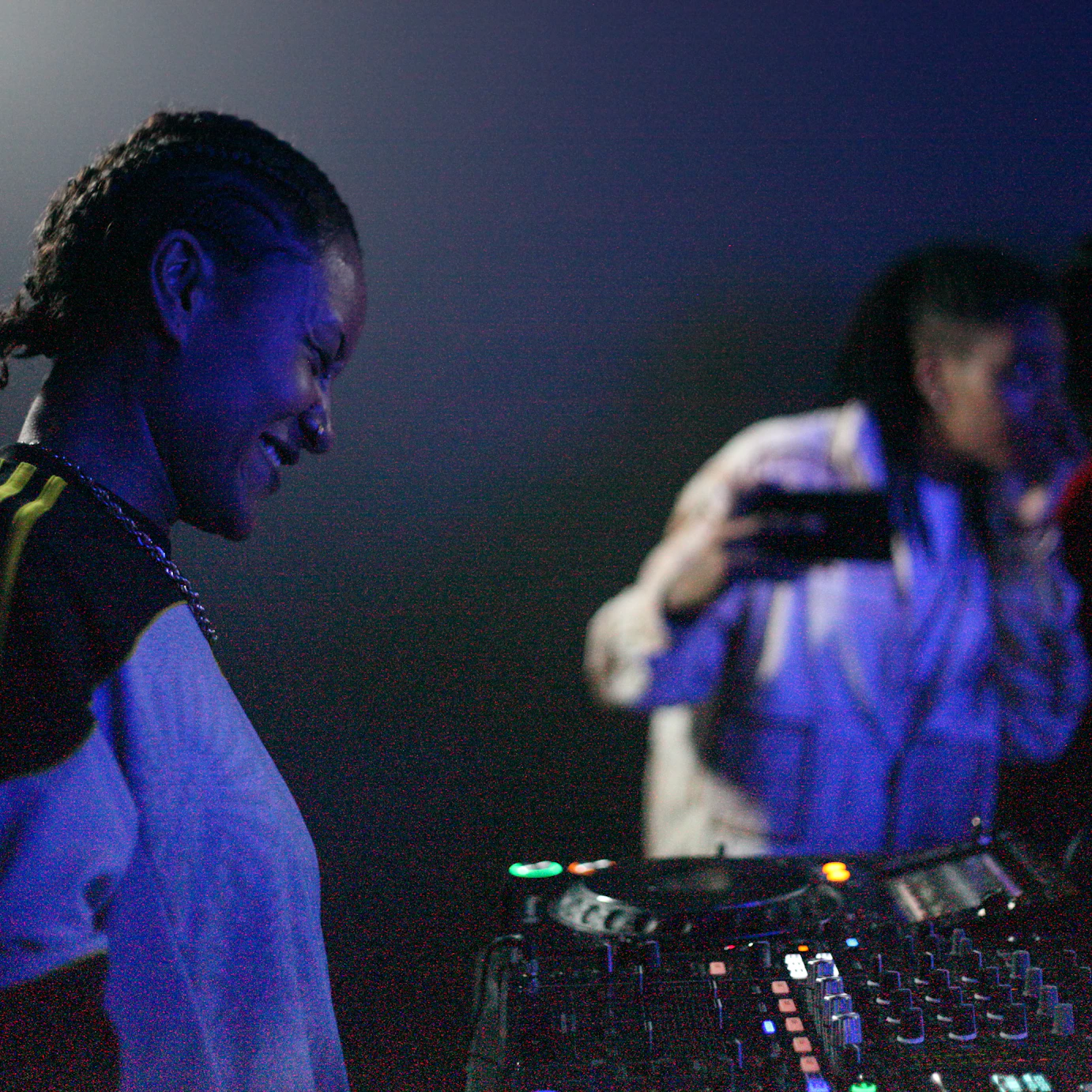 Afro Energy participants smiling on the decks during the listening party.