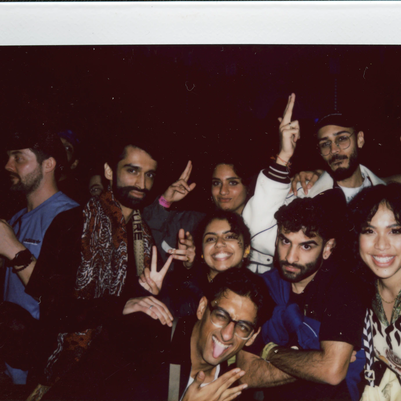 A polaroid photo of the Daytimers crew.