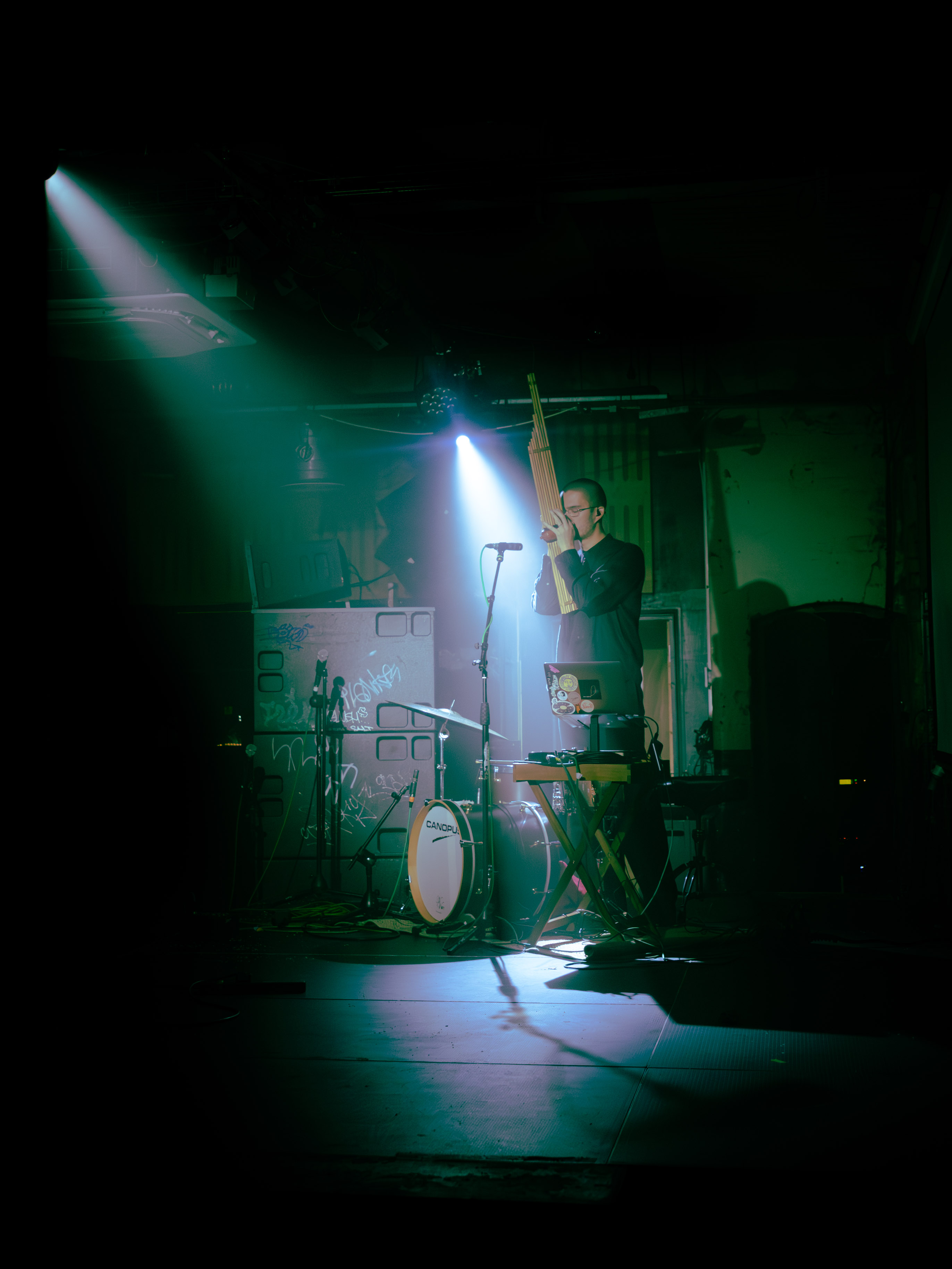 Kai playing the khaen on stage.