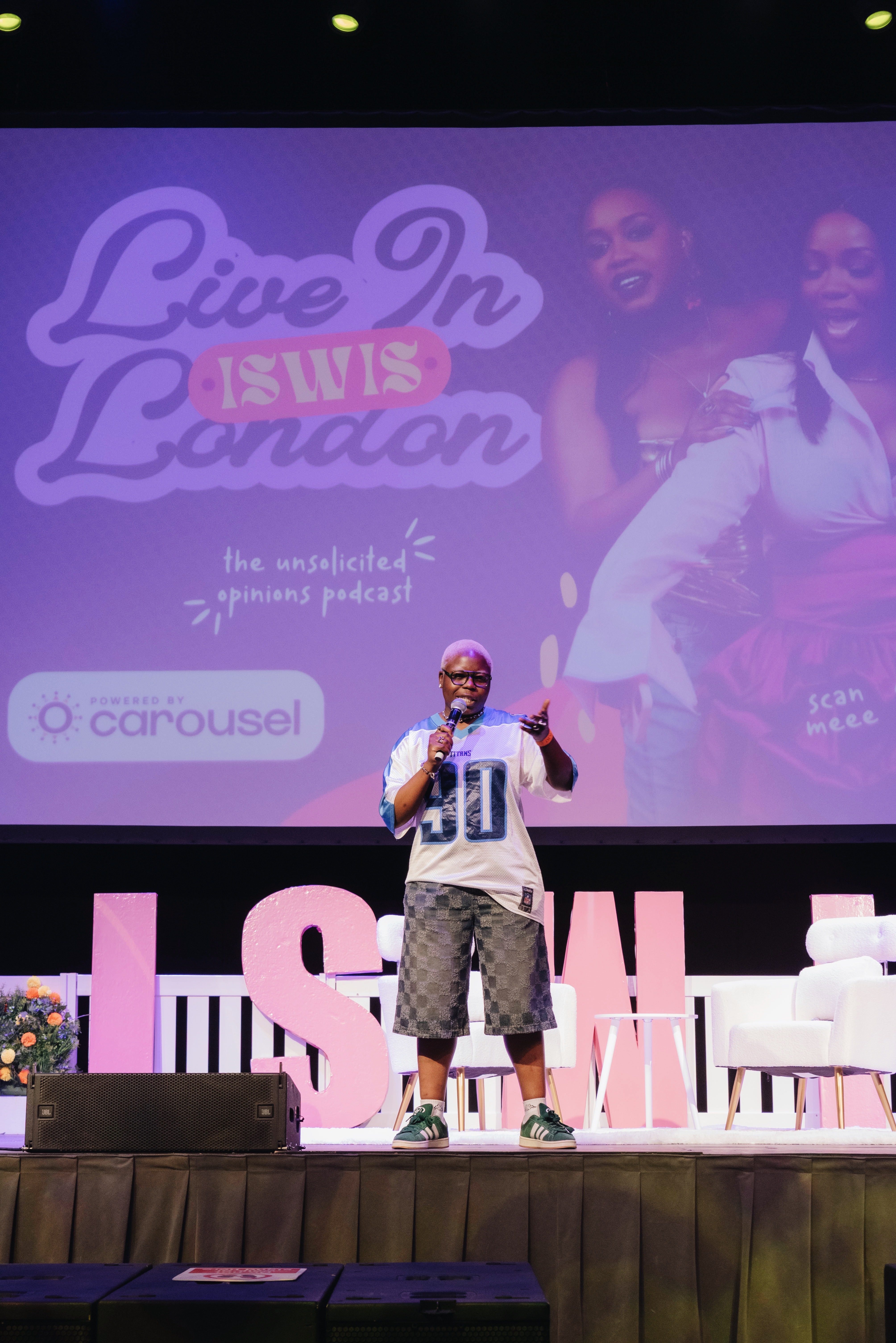 BazThePlug speaking on stage.