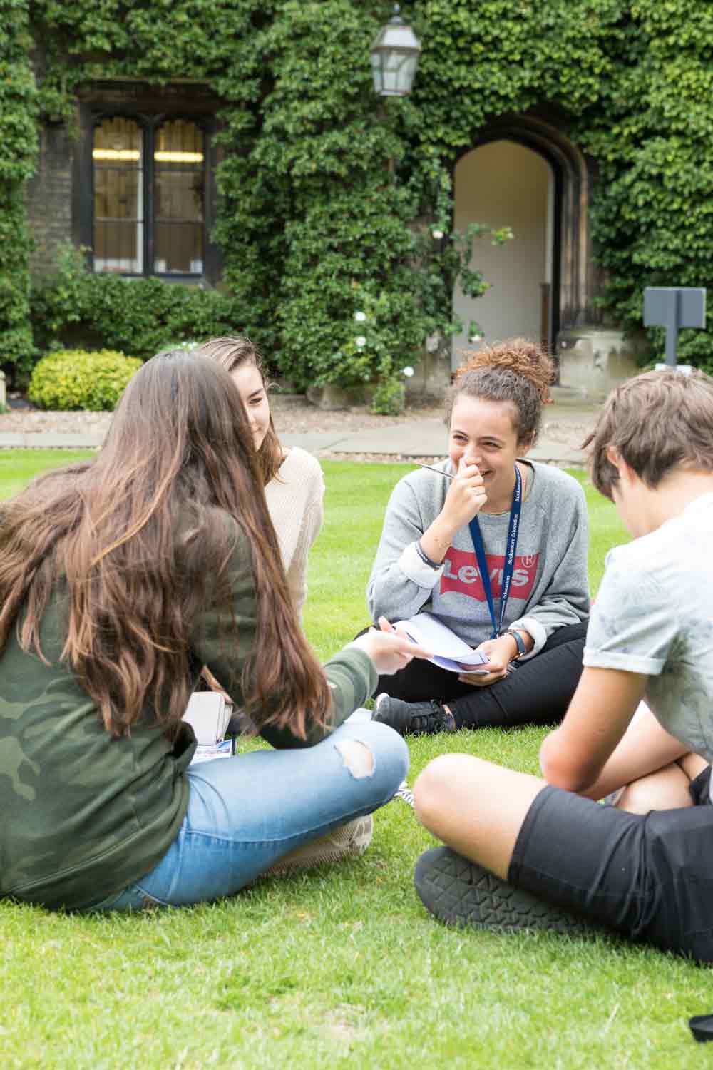 Students sitting on grass