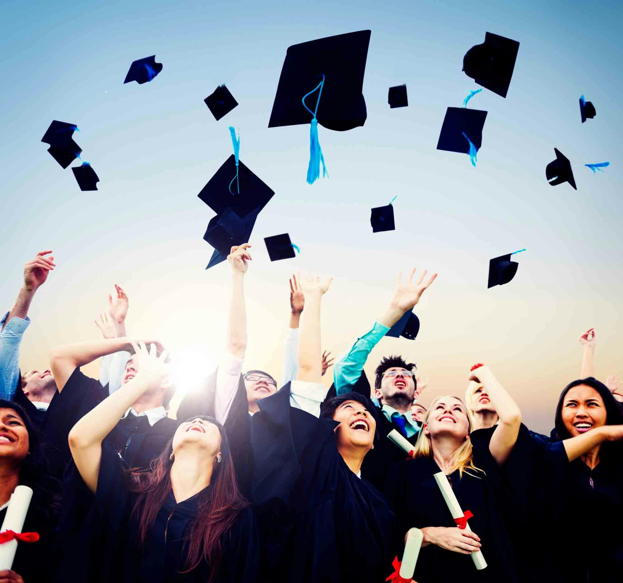 write a newspaper report changes made by the british in education system university students throwing mortar boards