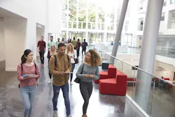 University students walking through a building
