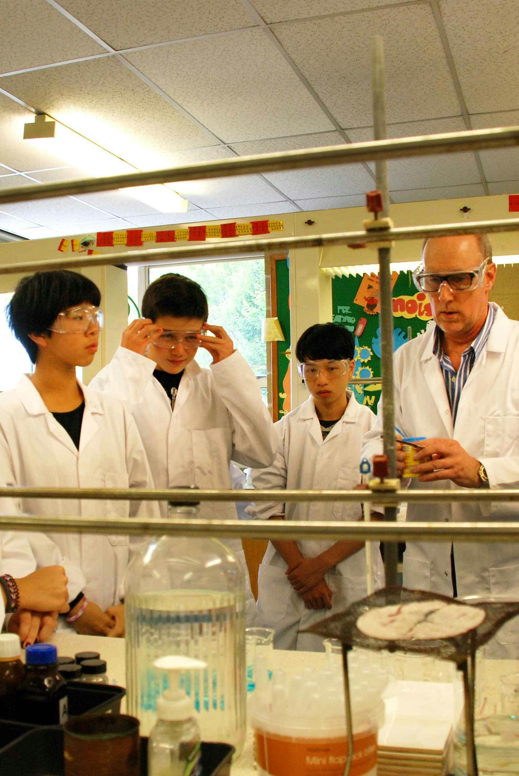 write a newspaper report changes made by the british in education system science class of students