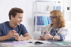 student talking to adult 