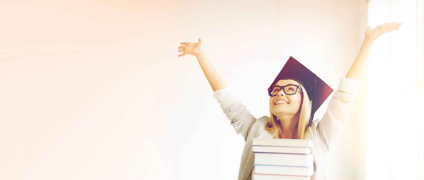 University student with their arms up
