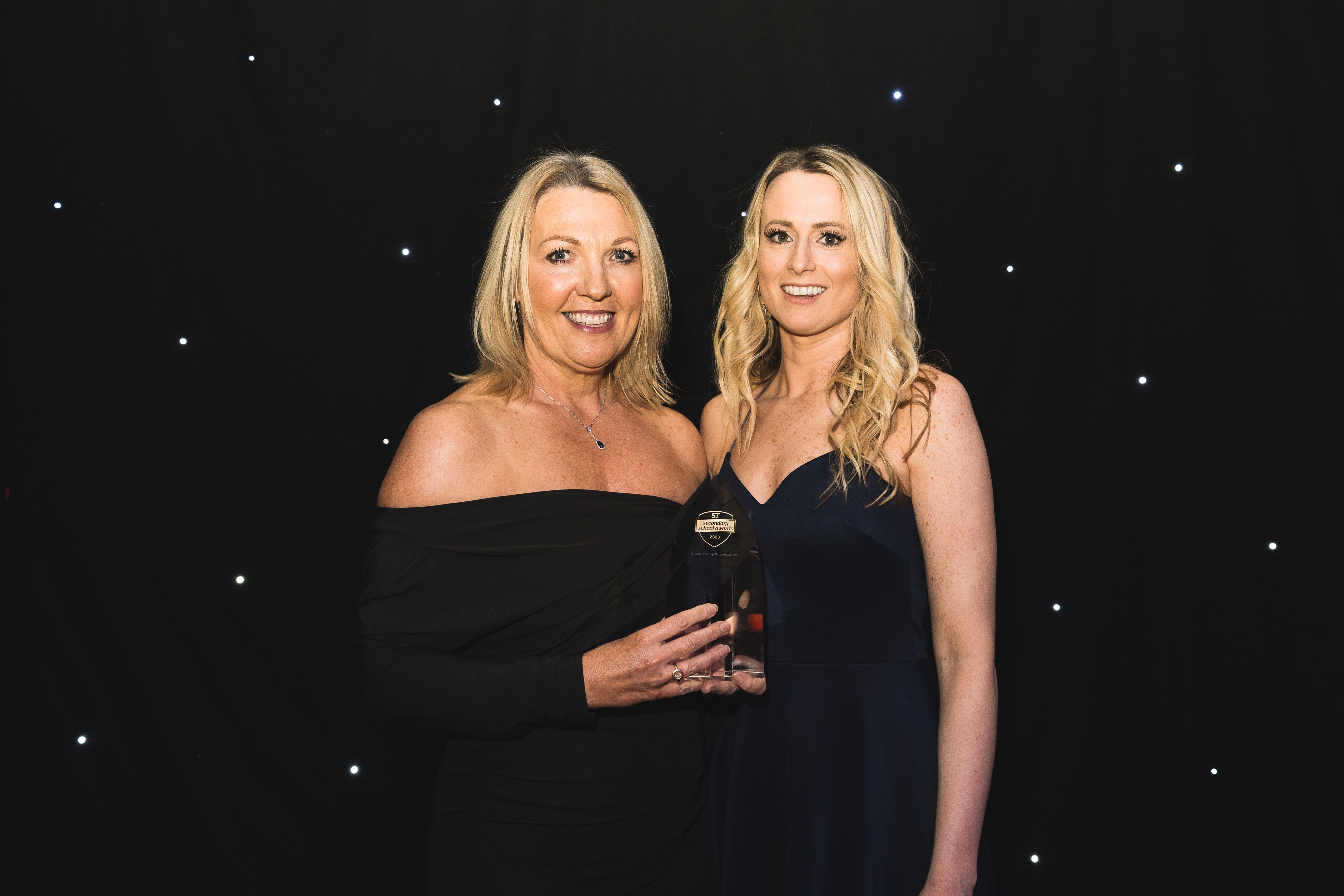 Lana and Charlotte with the award