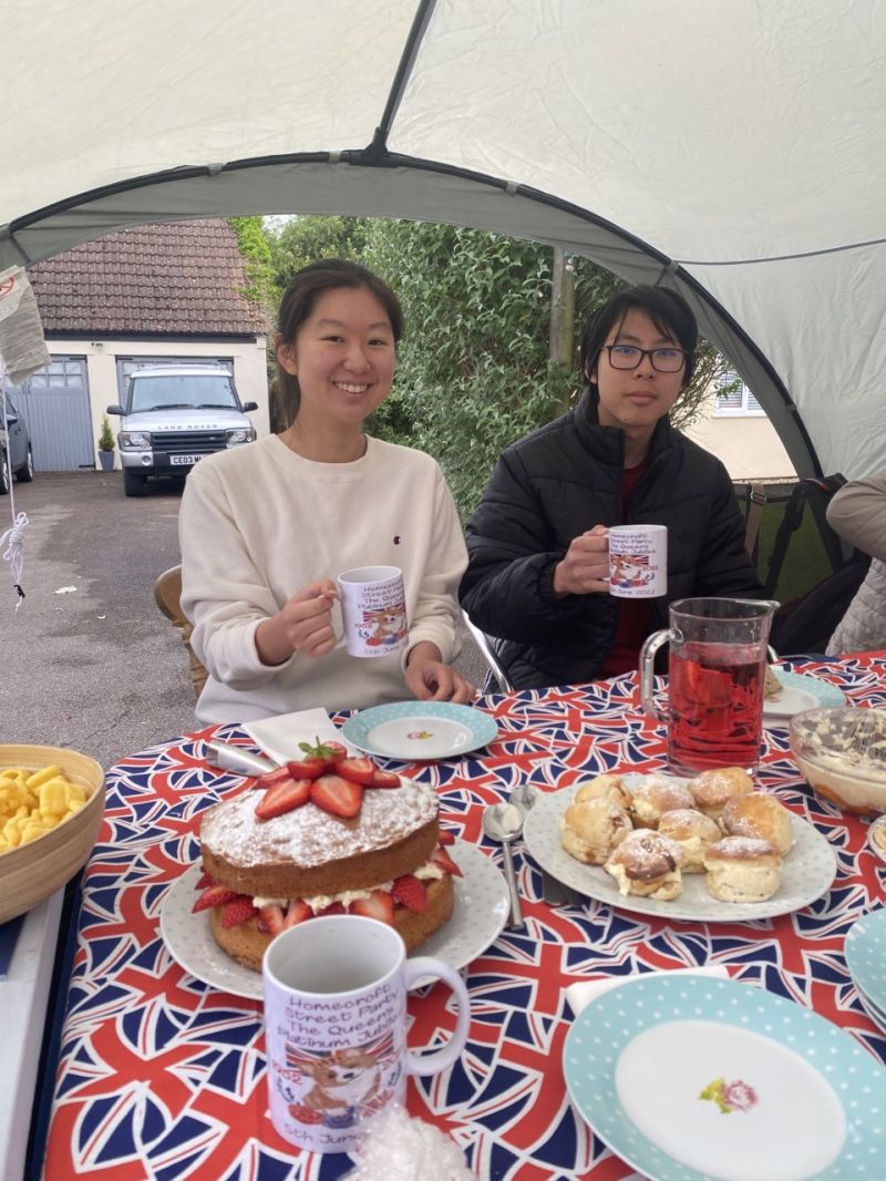 Two students at a jubilee street party