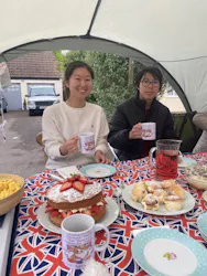 Two students at a jubilee street party