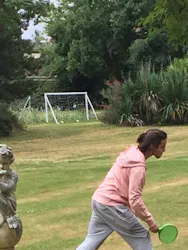 Student playing swingball