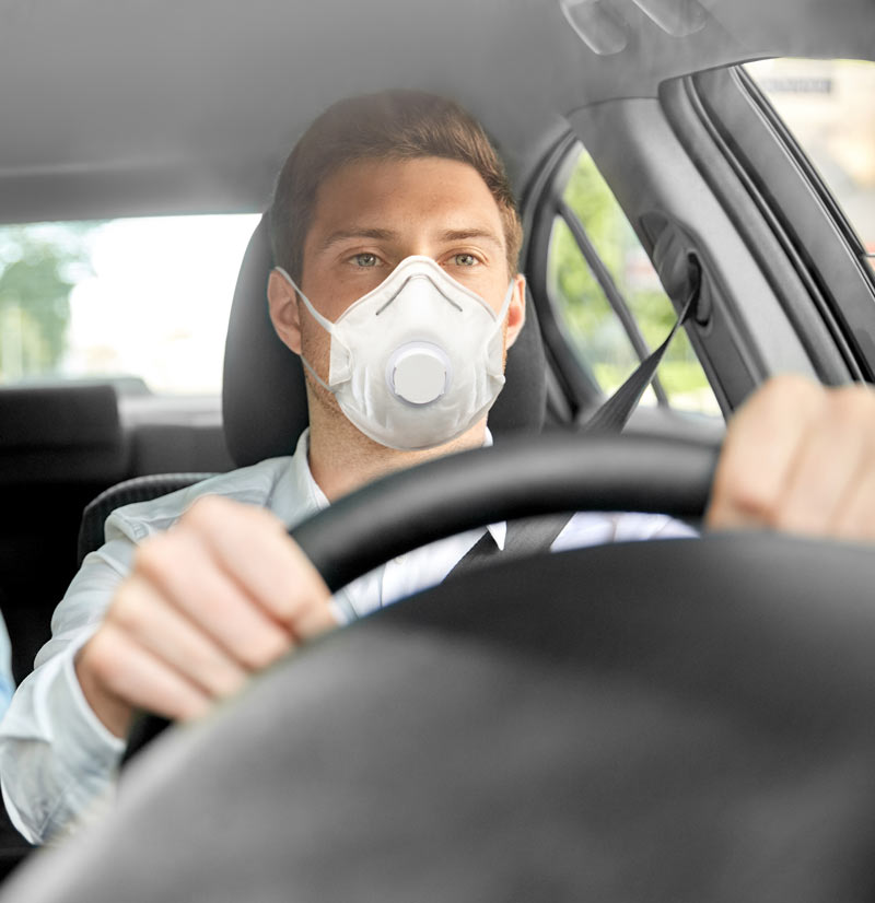 Taxi driver wearing a mask 