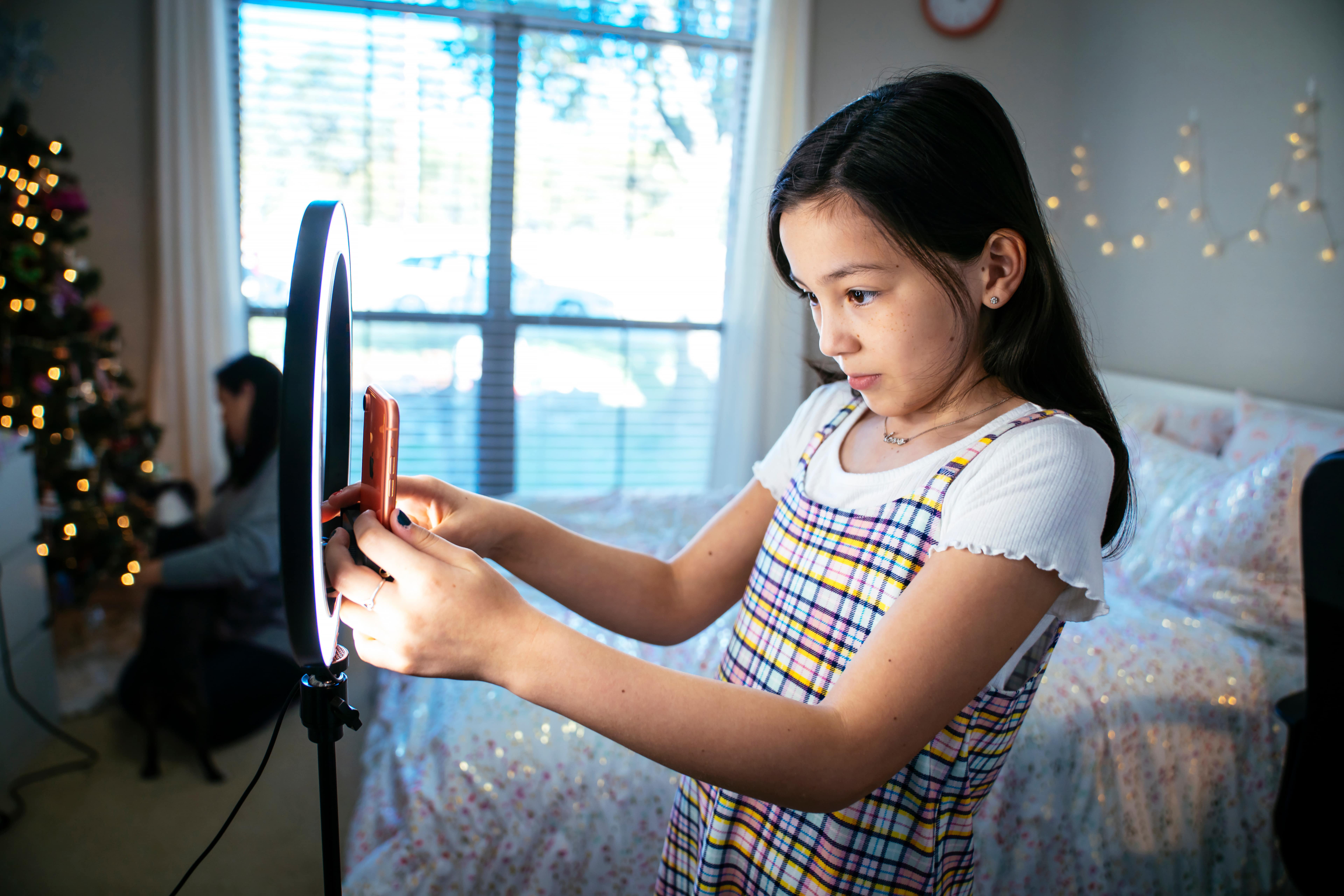 child filming a video