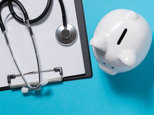 Stethoscope with piggy bank and pad