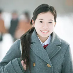 Girl in coat in winter