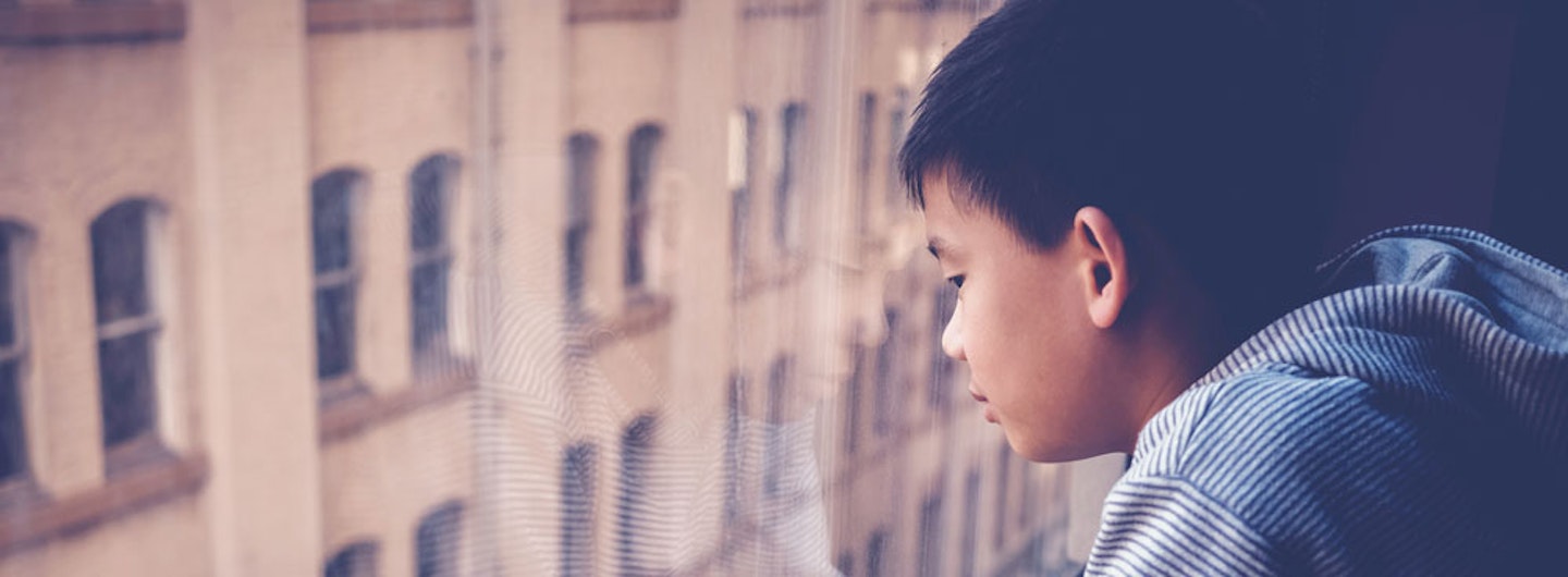boy looking out the window 