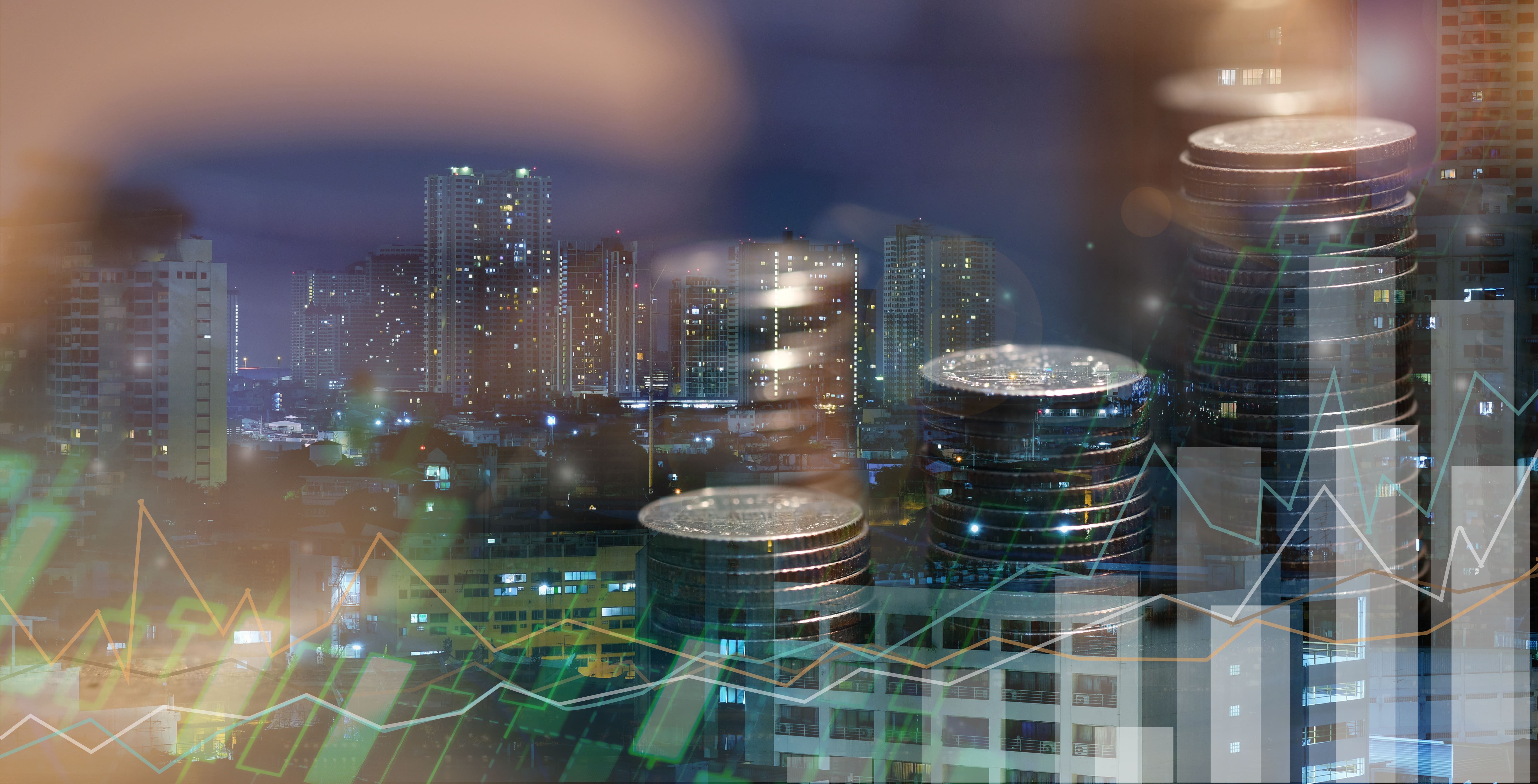 Cityscape with financial statistic overlay