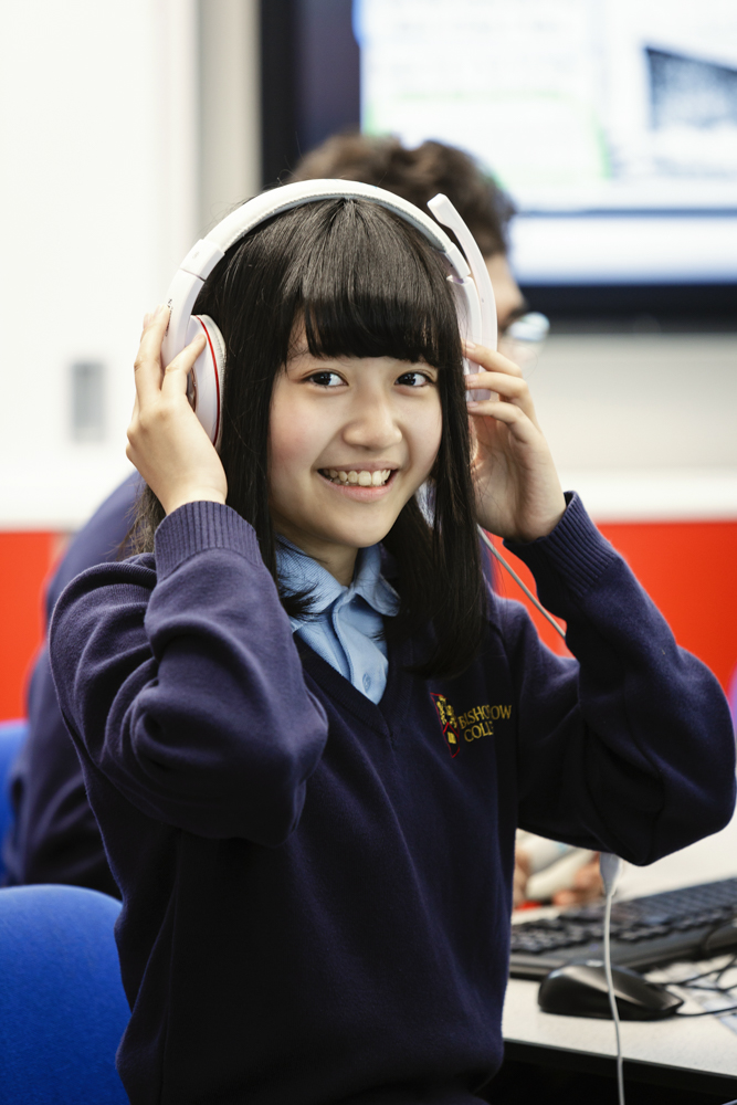 girl at Bishopstrow College with headphones on 