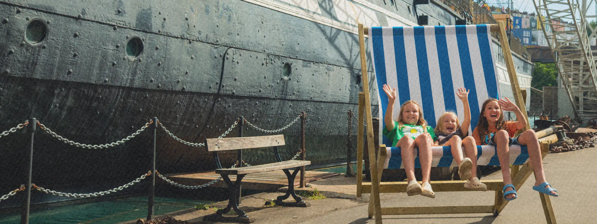 Children having fun in summer at Bristol Dockyards