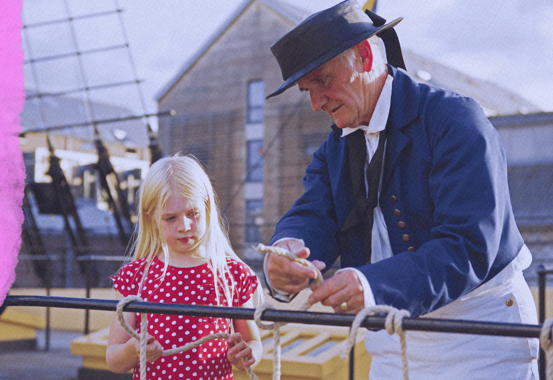 Member and child on weather deck of ship 