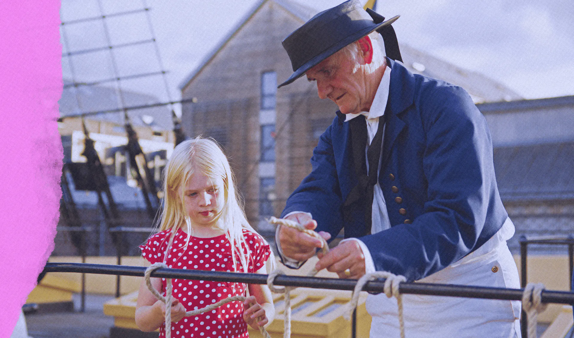 Member and child on weather deck of ship 