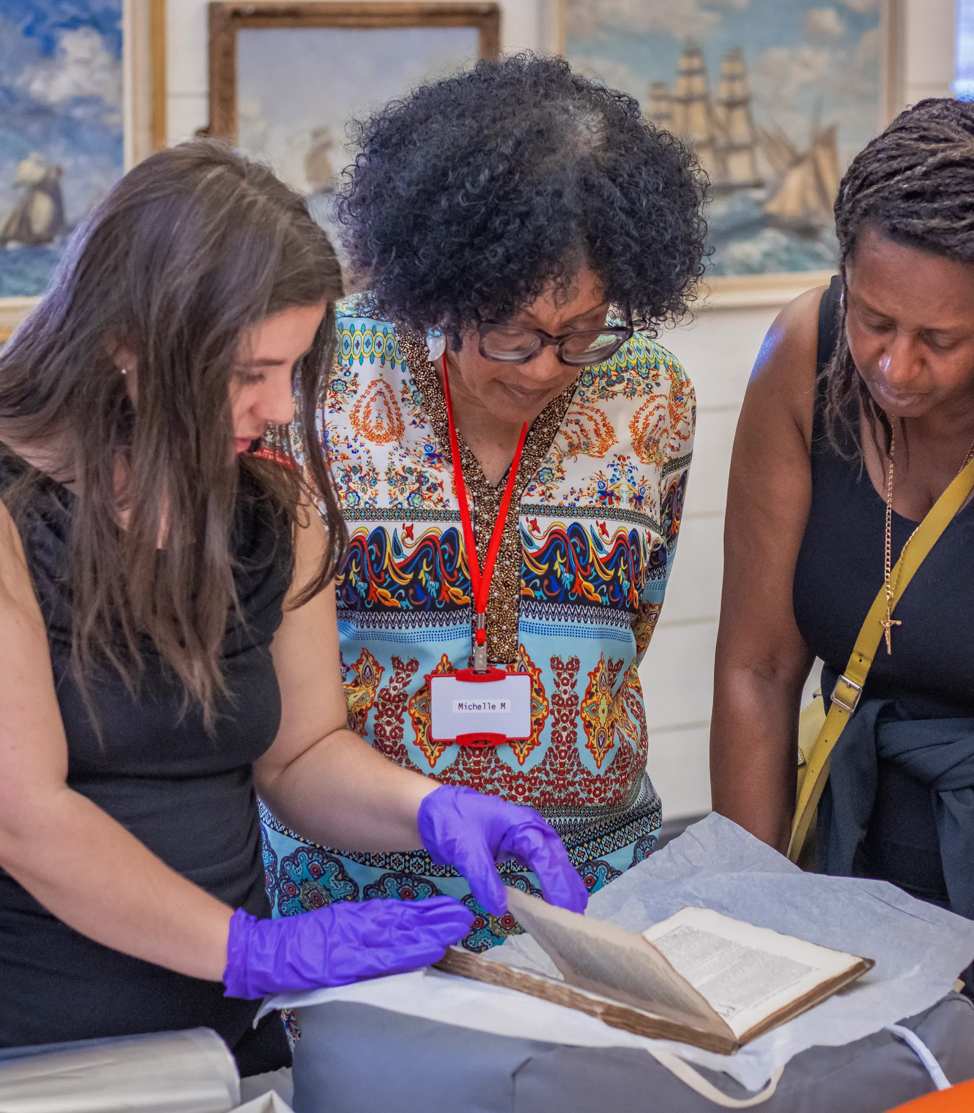 Three women attending Archive in Five 
