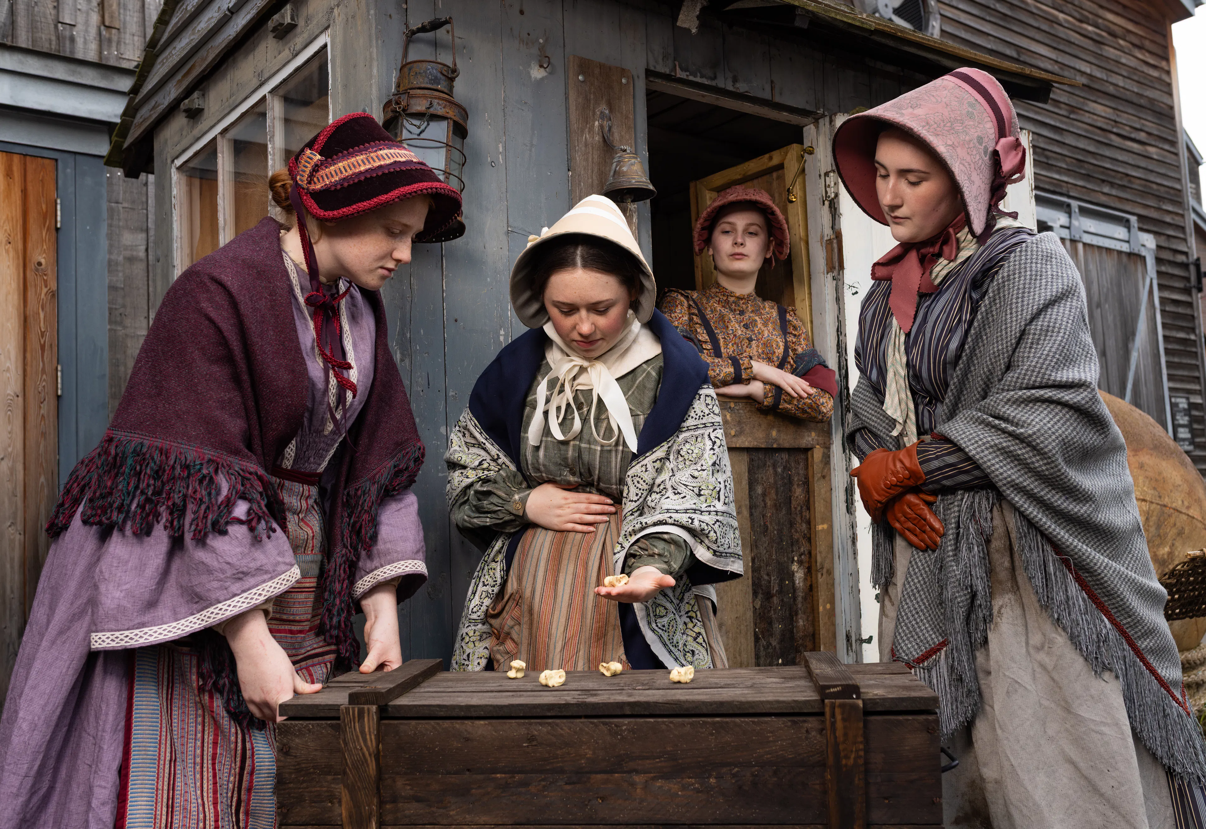 Four costumed Victorian volunteers at Bristol Dockyards 