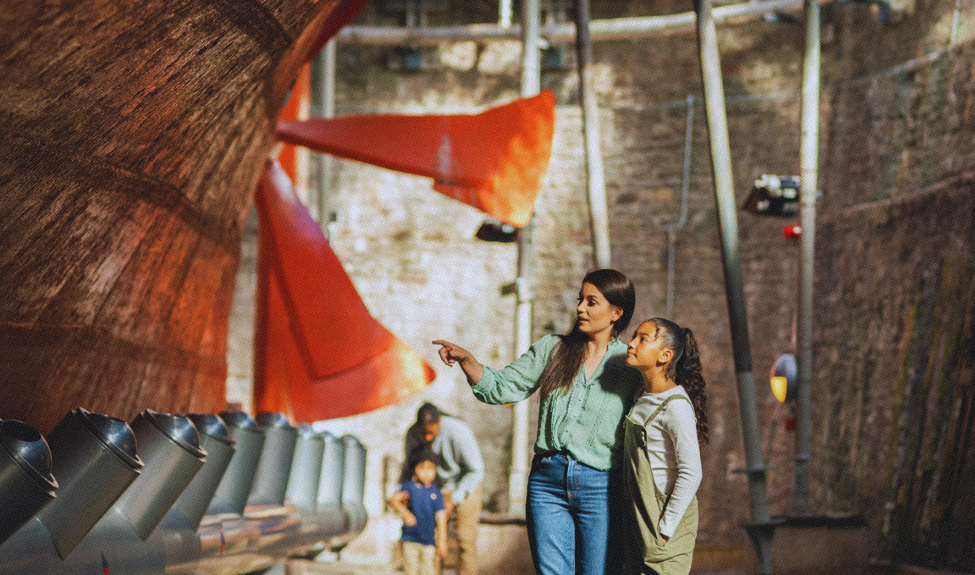Family visiting Bristol Dockyards in the Dry Dock of the SS Great Britain