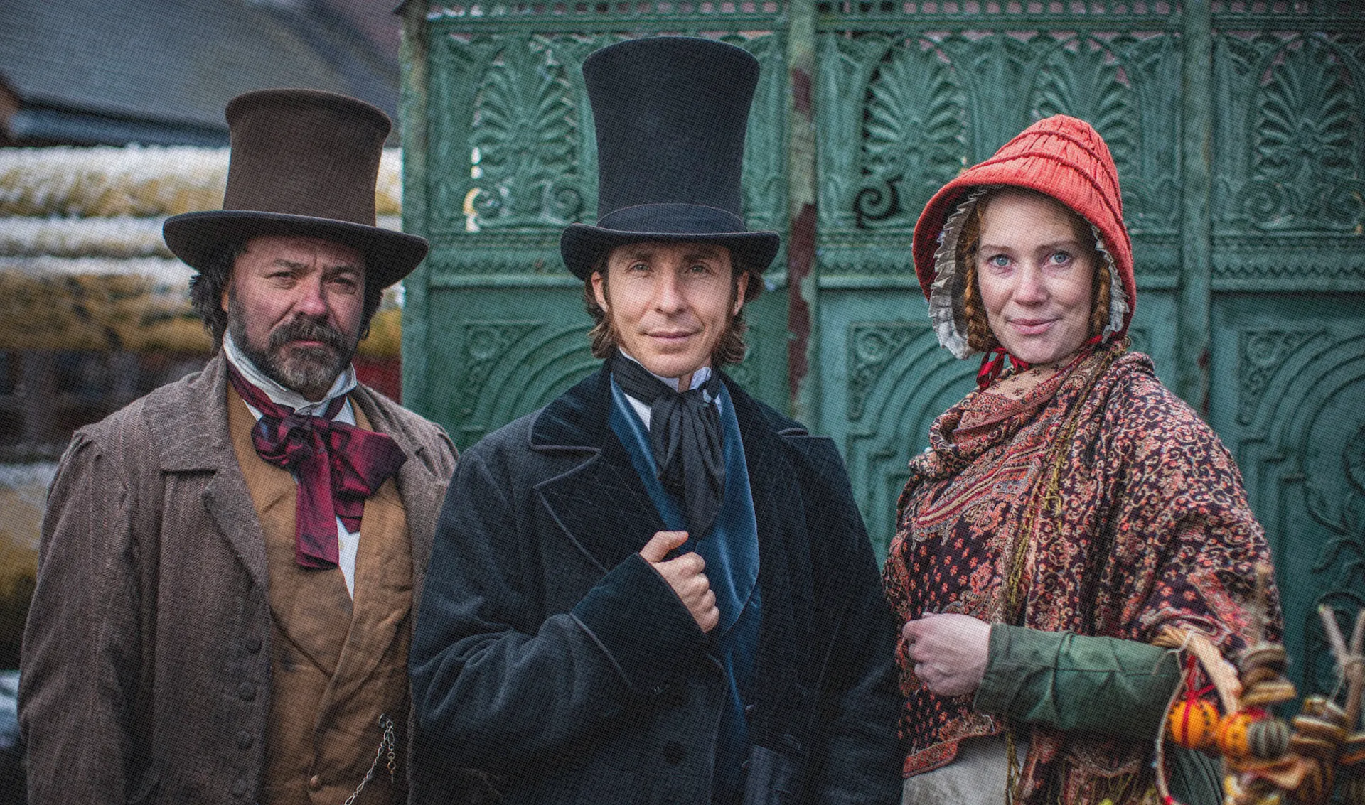 Three costume Victorian passengers ready to board the SS Great Britain