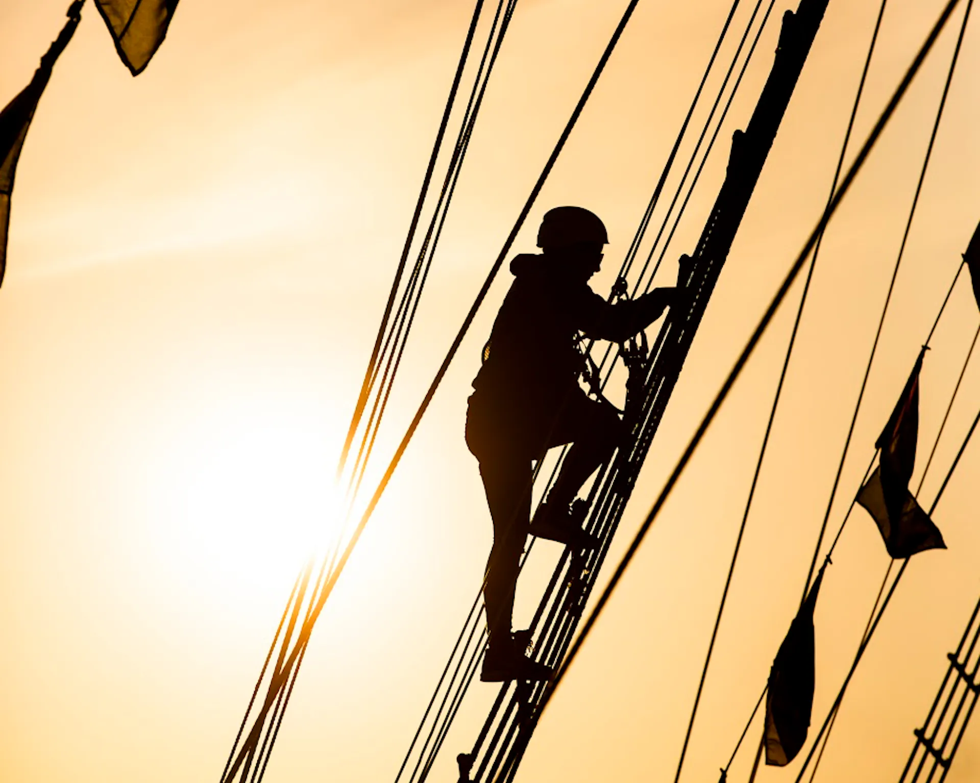 Someone climbing the rigging of the SS Great Britain 