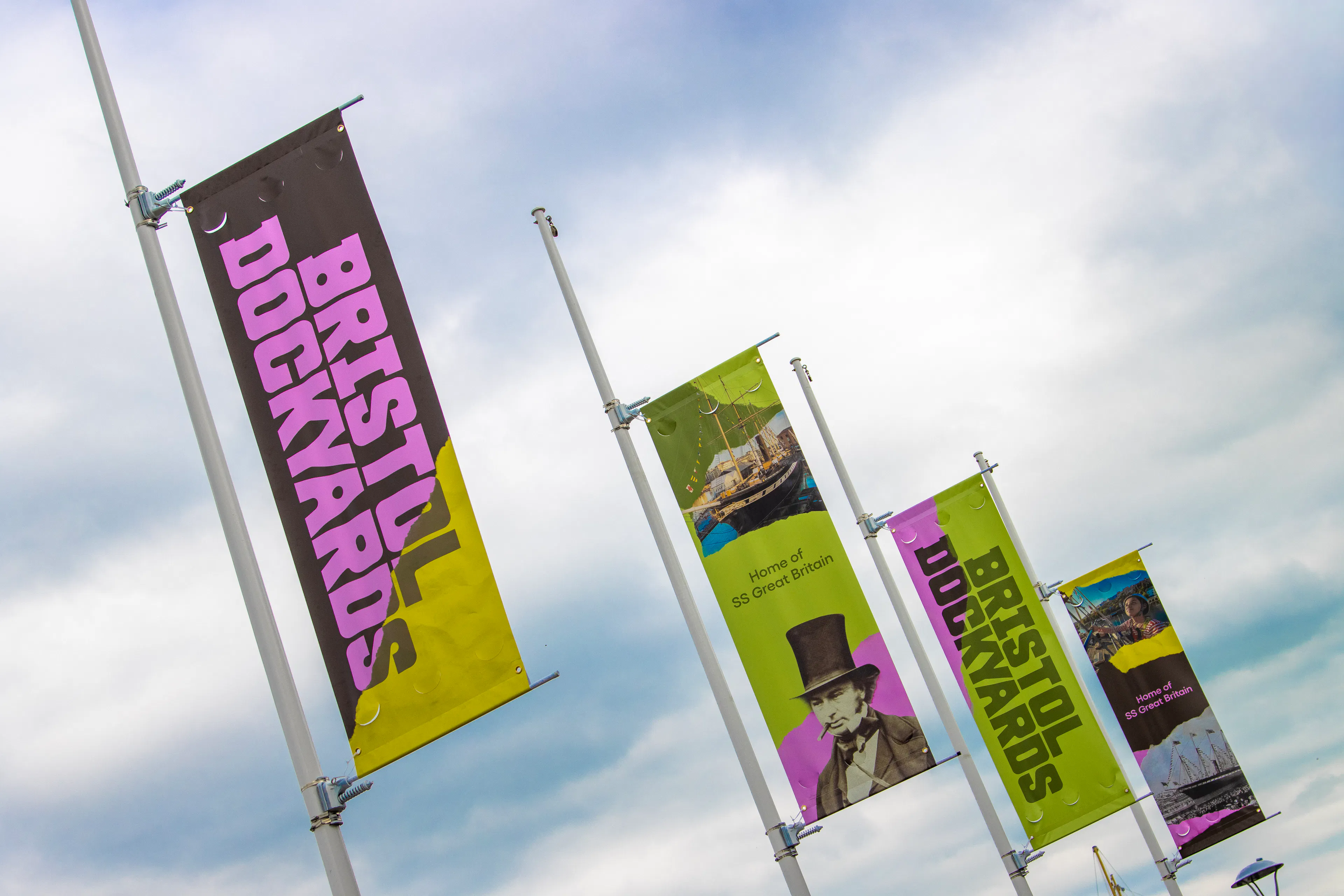 Colourful flags displaying the Bristol Dockyards branding