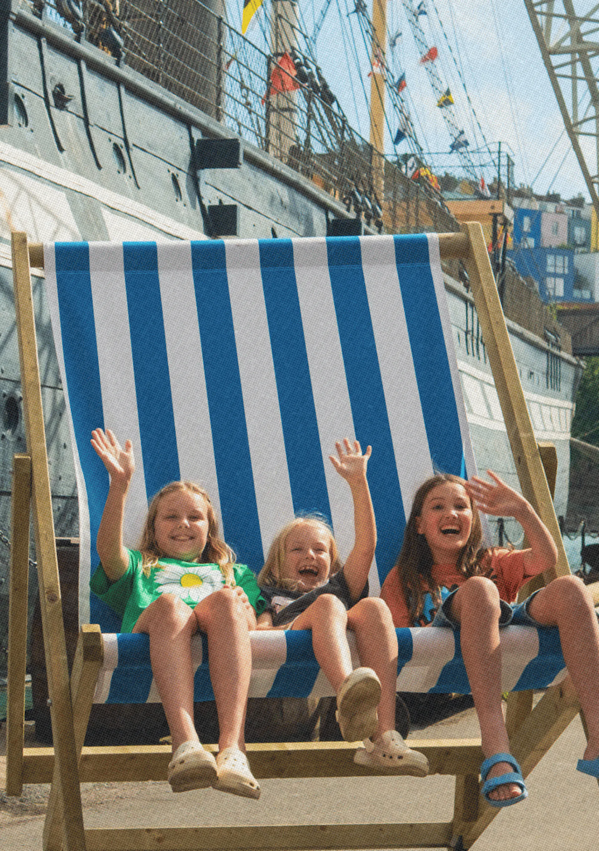 Children having fun in summer at Bristol Dockyards