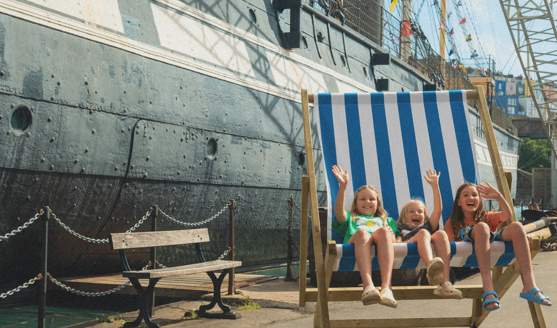 Children having fun in summer at Bristol Dockyards