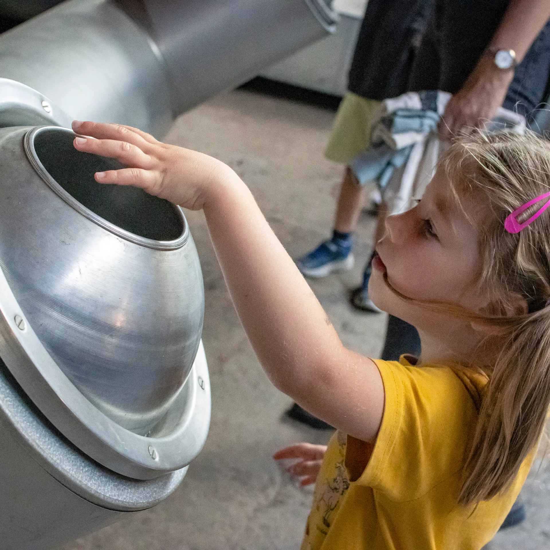 a girl checks out the dehumidifiers in the dry dock