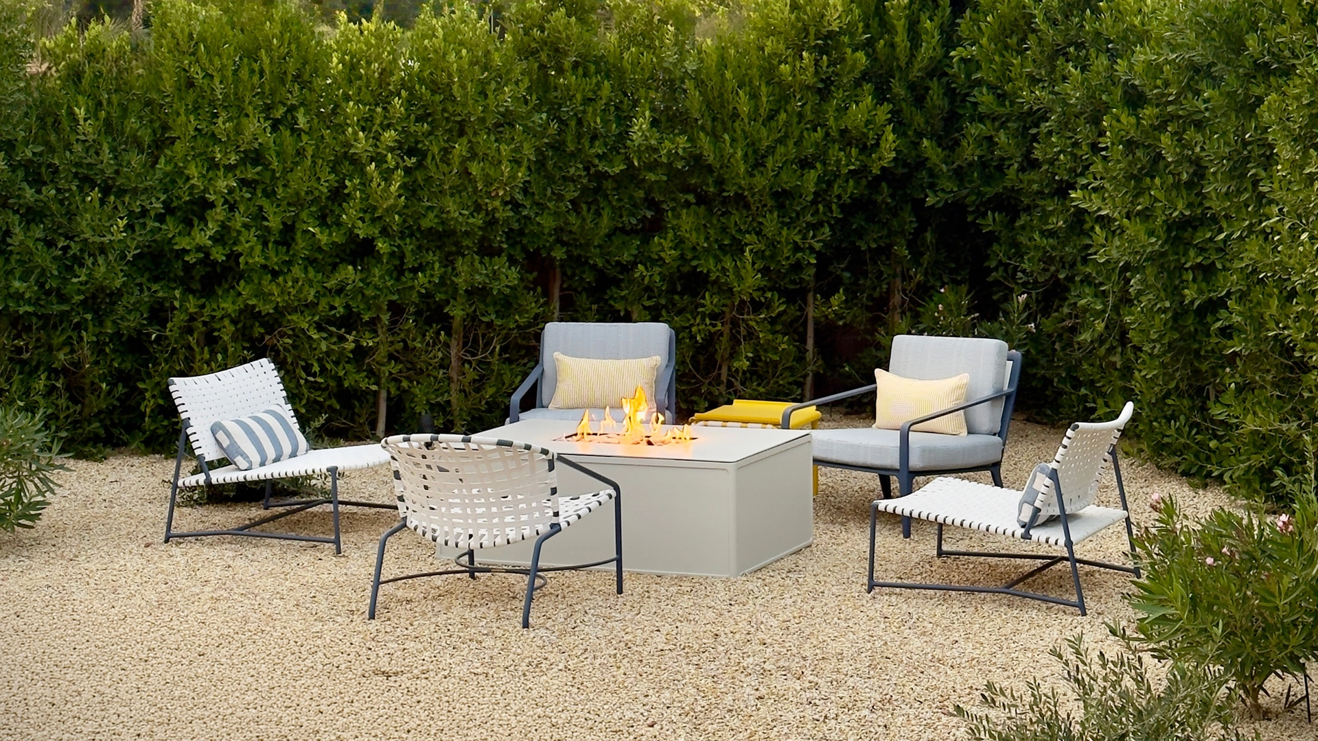 Still Lounge Chairs by Fire Table