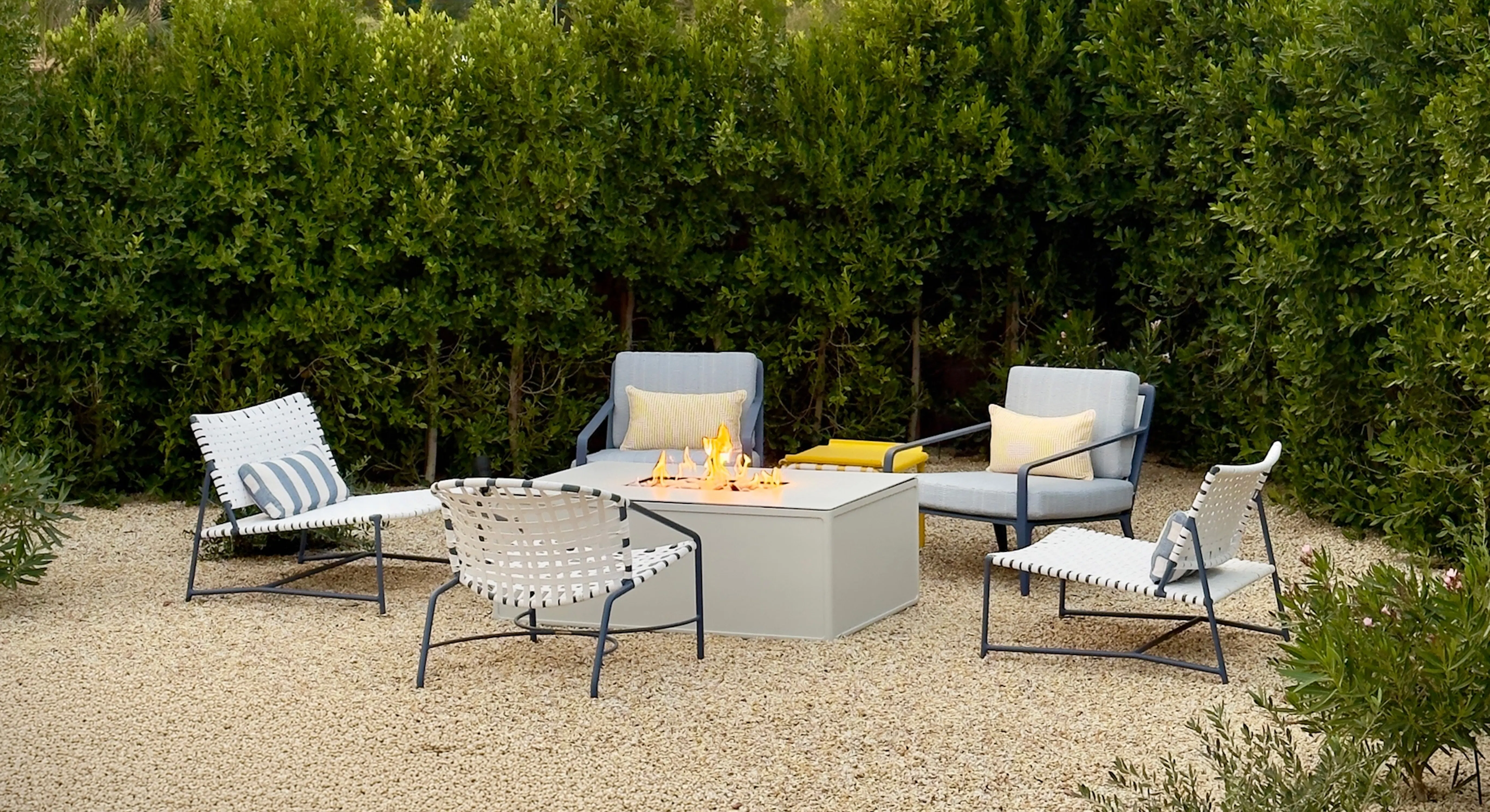 Still Lounge Chairs by Fire Table