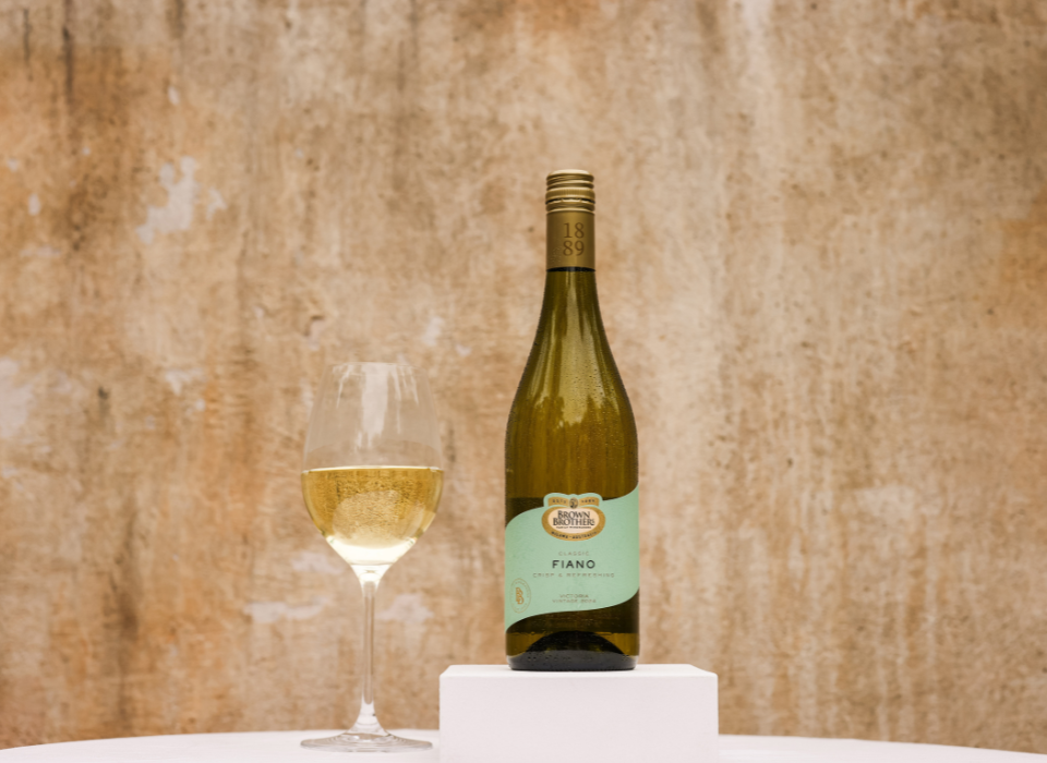 A bottle of Brown Brothers Classic Fiano with a glass of wine