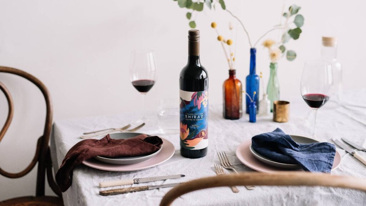 Bottle of Brown Brothers Blaze Aid Shiraz on table