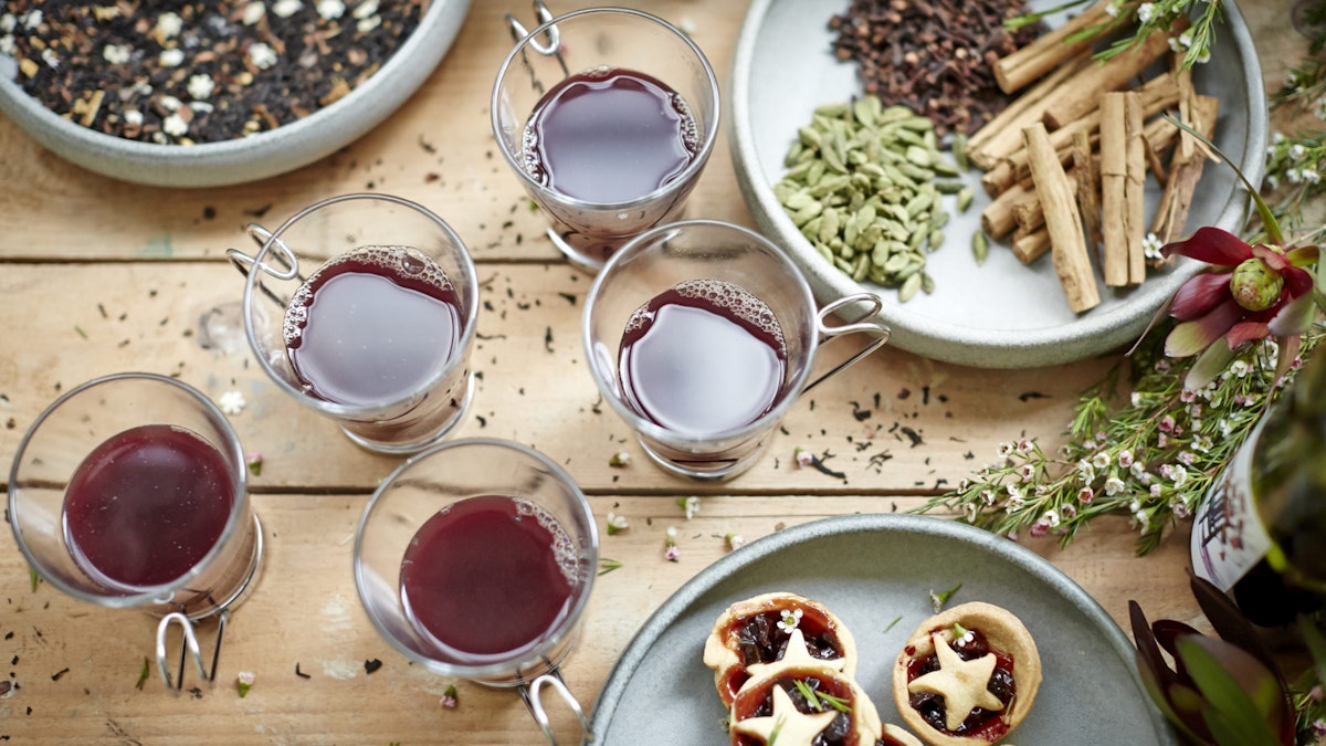 Mulled wine alongside fruit tarts