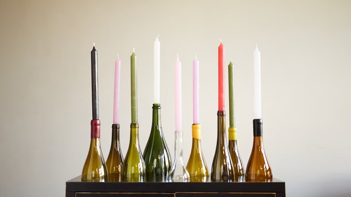 upcycled wine bottles used as candle holder