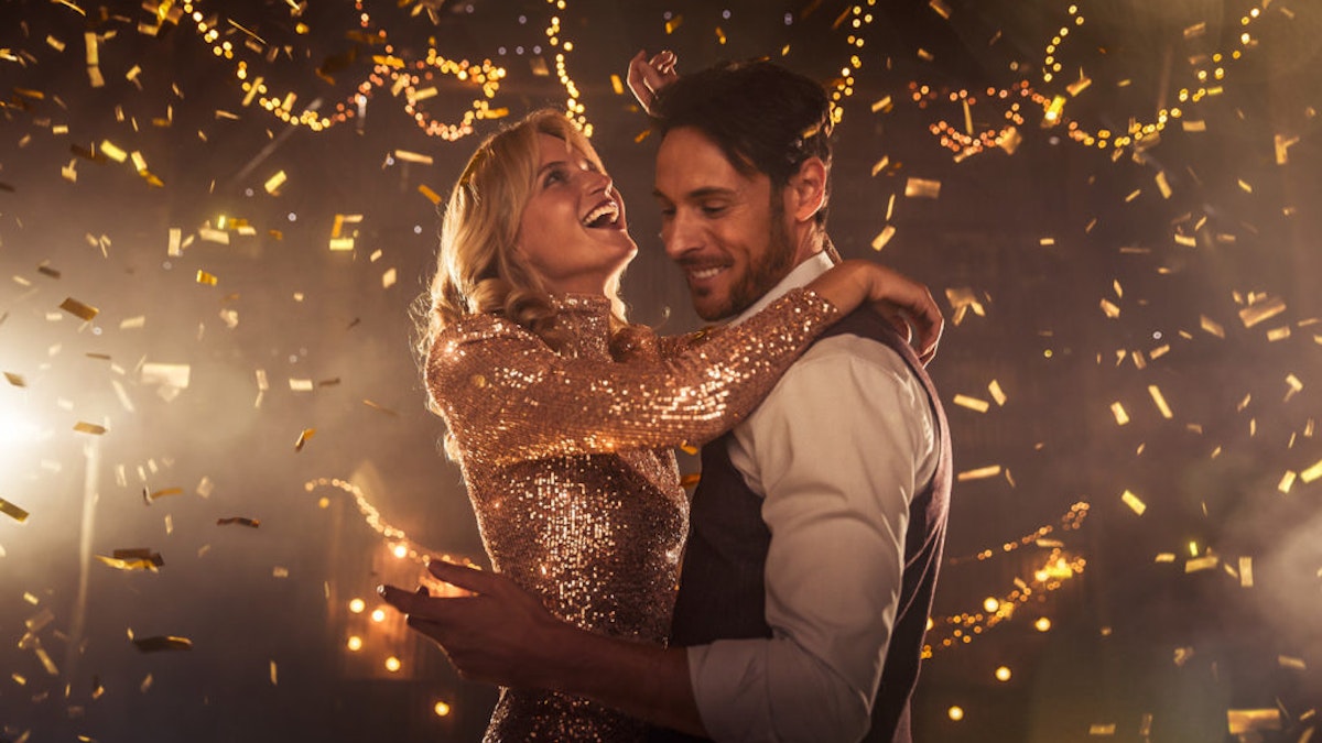 Man and women embracing during a celebration