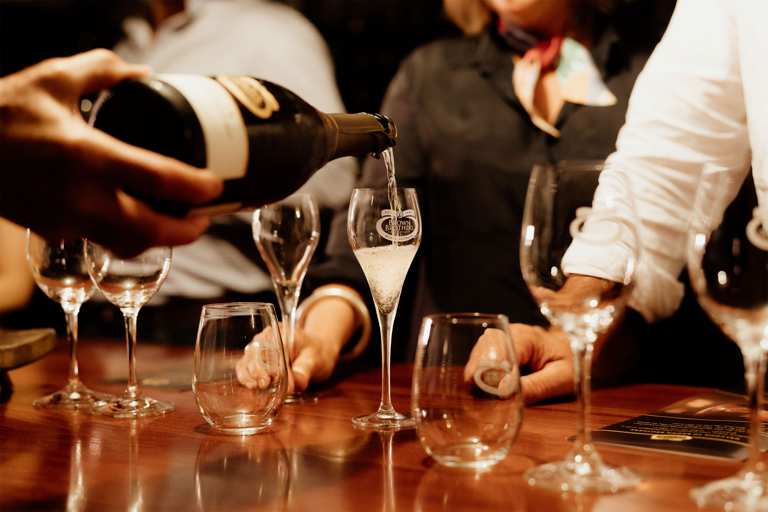 Sparkling wine being poured in Family Cellar