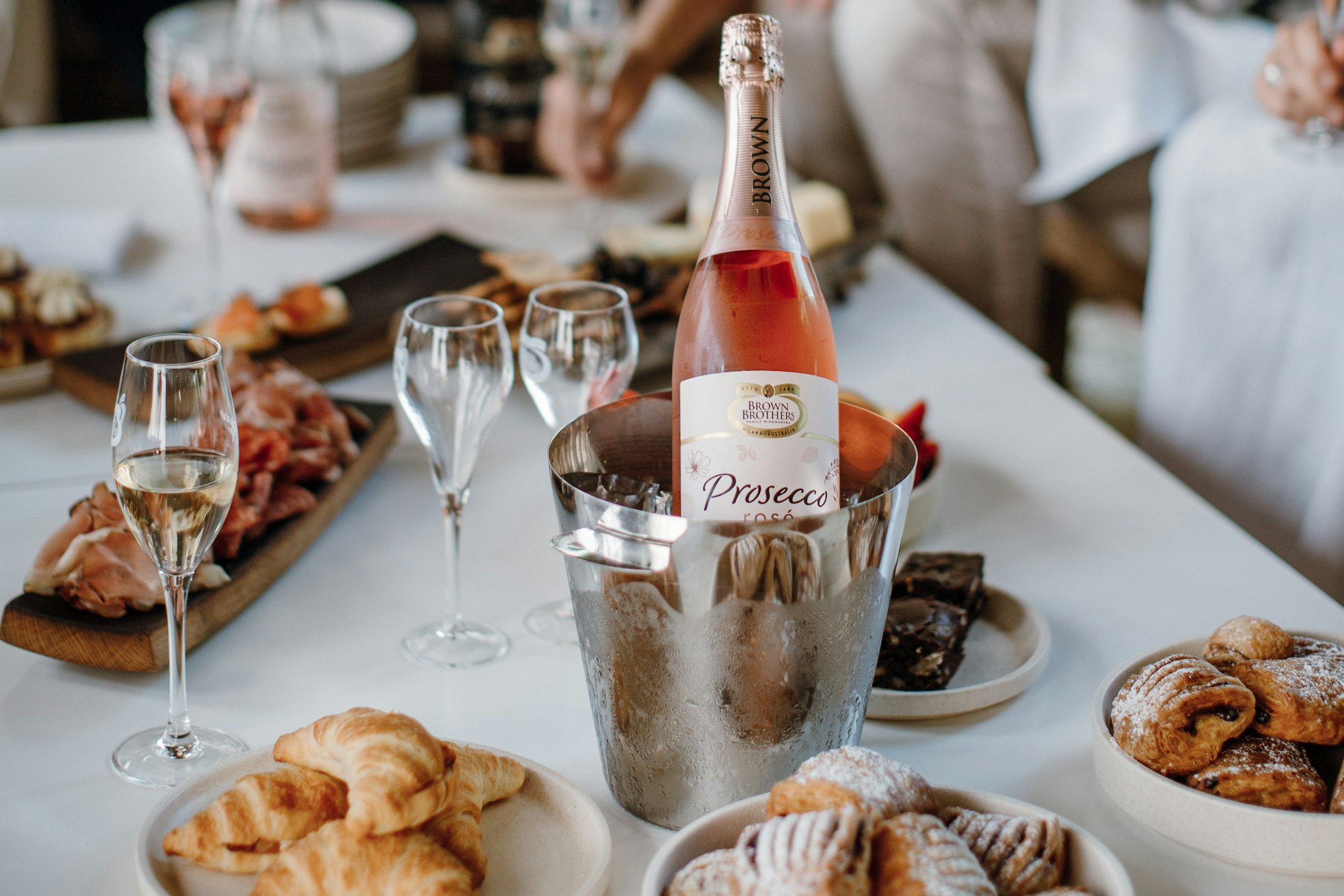 Brown Brothers Prosecco Rose among selection of sweets and pastries