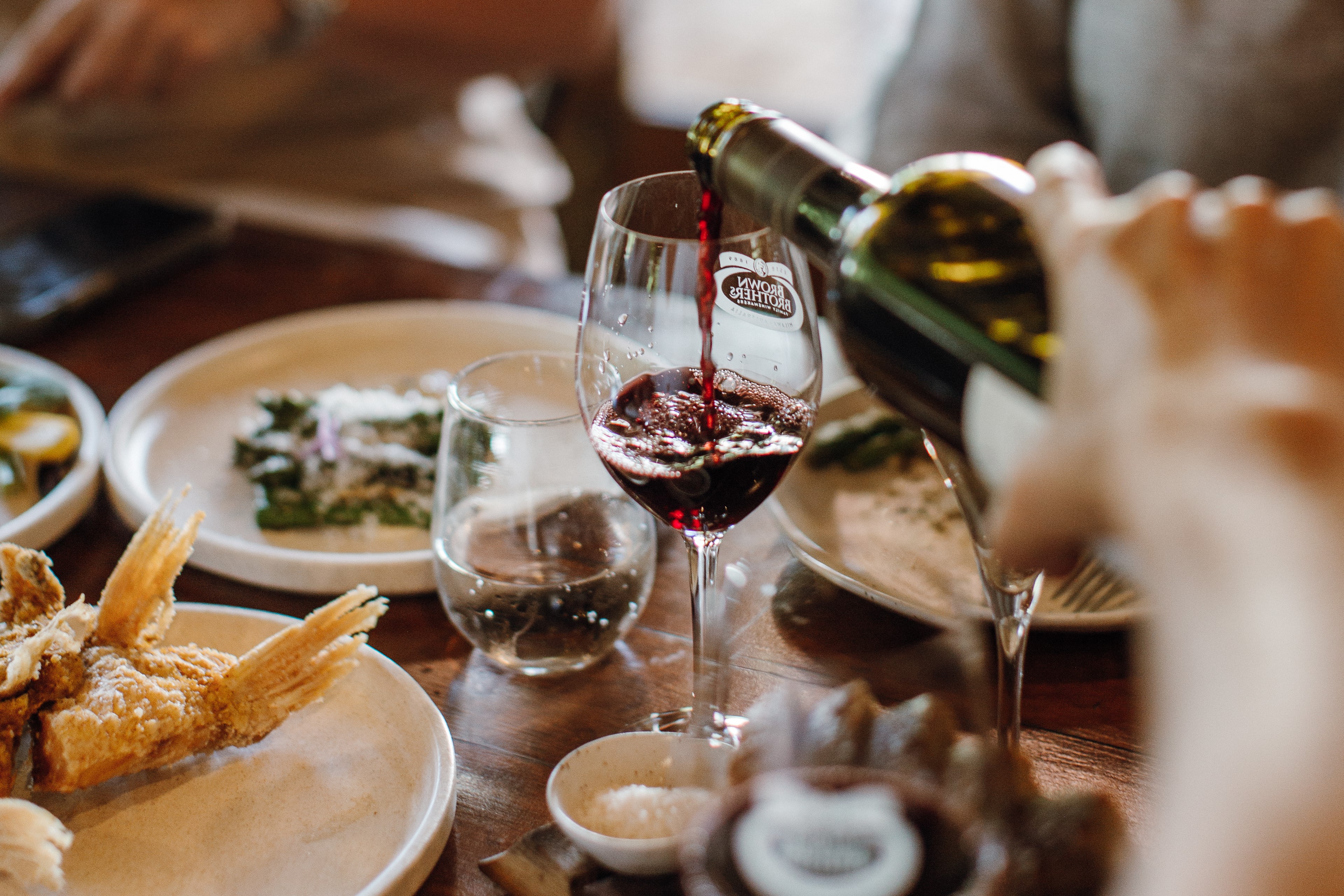Brown Brothers Restaurant food and red wine pouring