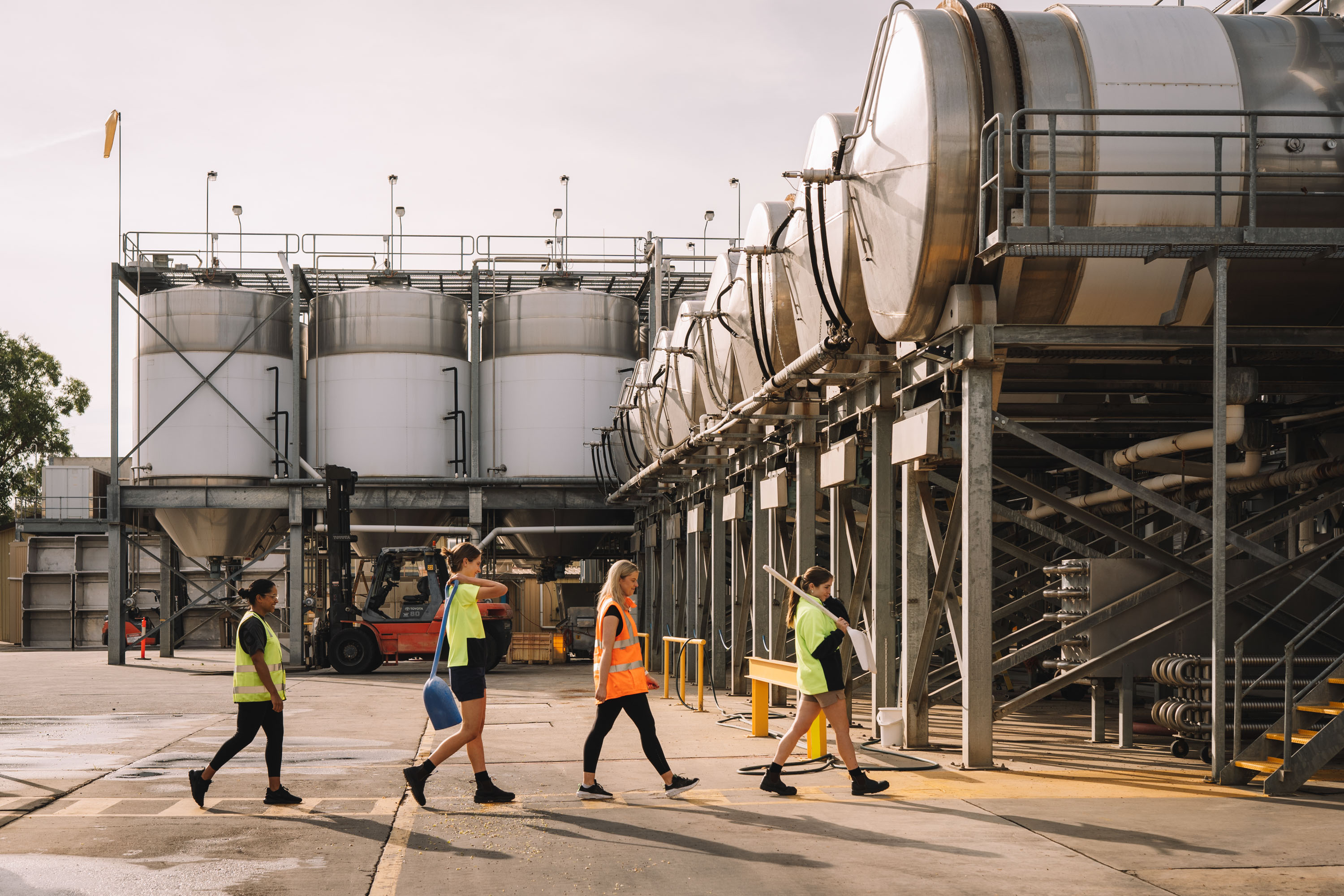People walking through the winery