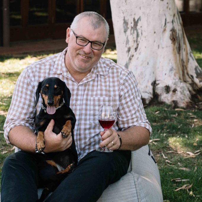 Milawa site grounds Cam with dog