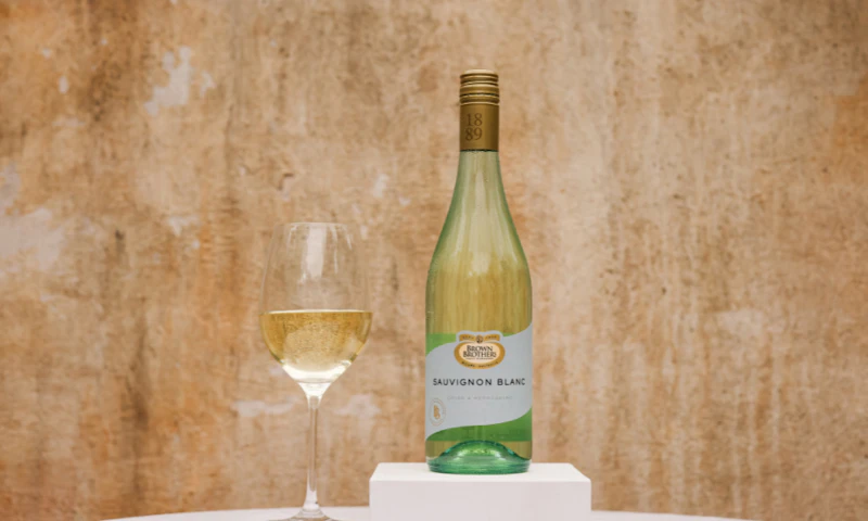 Brown Brothers Classic Sauvignon Blanc Bottle with a glass of wine